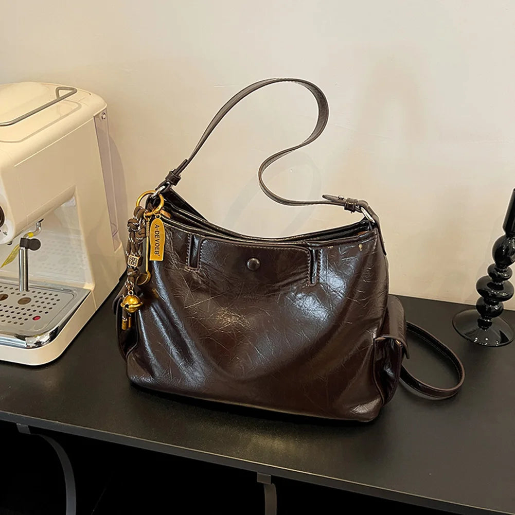 Women Casual Underarm Bag with Pendant Retro Crossbody Bag PU Leather Trendy Tote Bag Travel Shopping Work Date Bag